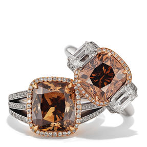 Rings in 18k white gold and rose gold set with Orange Brown diamond and colourless diamonds. Available in different sizes.
