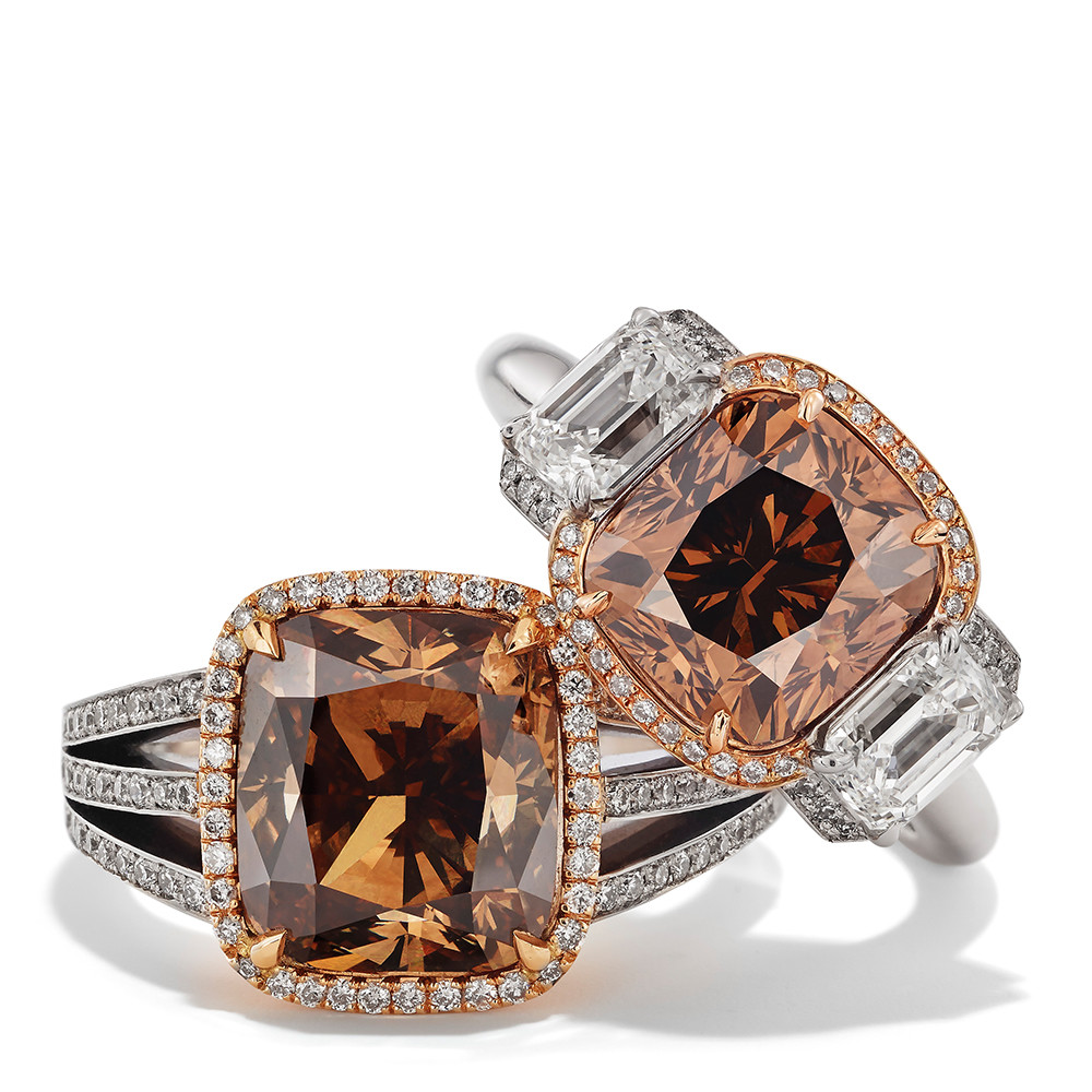 Ringe in 750 Weißgold und Roségold mit Orange Brown und weißen Diamanten. Erhältlich in verschiedenen Größen.
